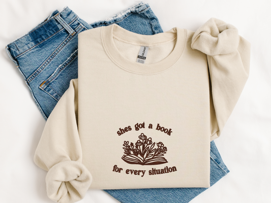 She's Got a Book Embroidery Sweatshirt